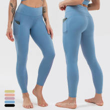 Pantalones atléticos Pantalones delgados Leggings de fitness de cintura alambulada con bolsillos con leggings de yoga sin costuras sólidas